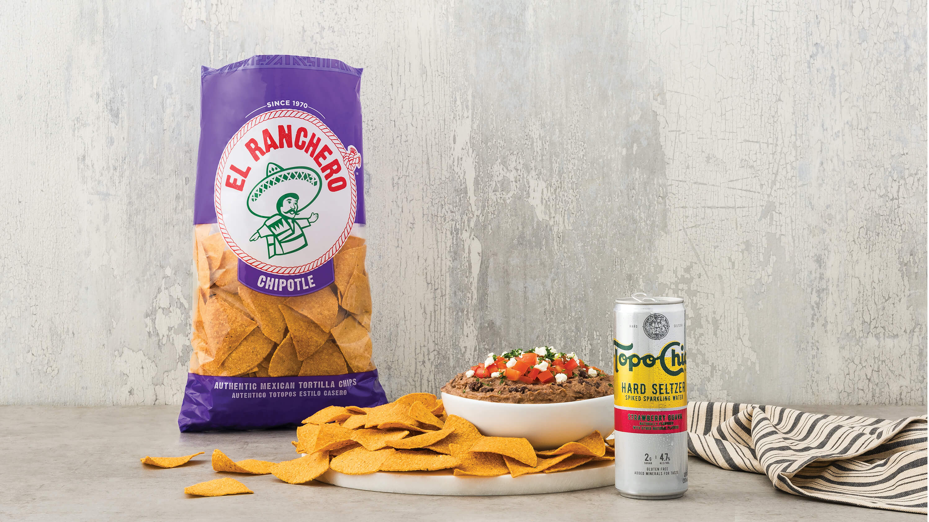 Topo Chico with Black Bean Dip