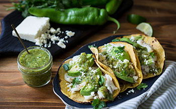 Fish tacos with hatch chile sauce