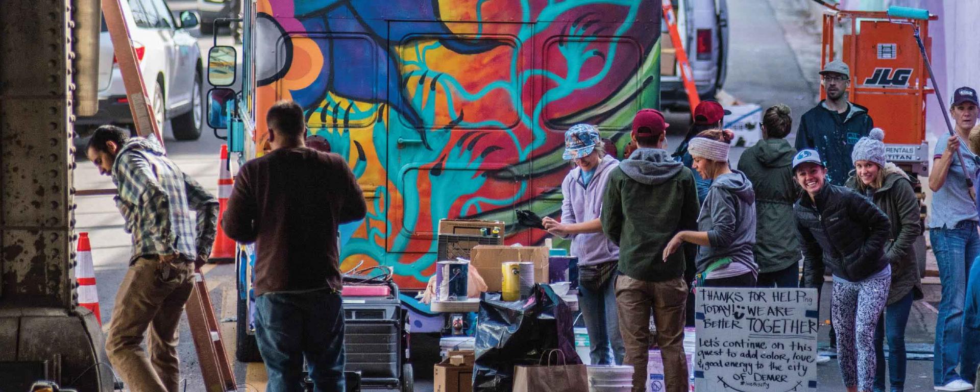 employees painting a bus